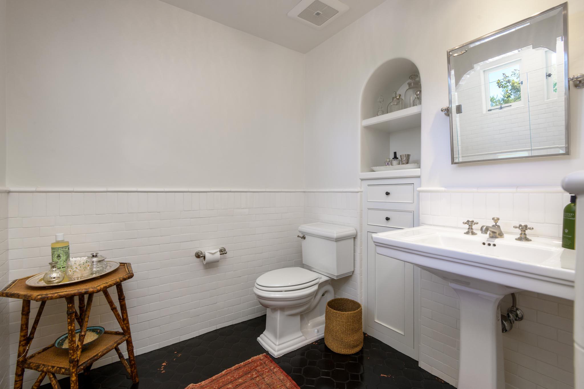 1530 Lingate Lane Montecito, CA 93108 - Photo 18 of 23 a bathroom with a toilet sink and mirror