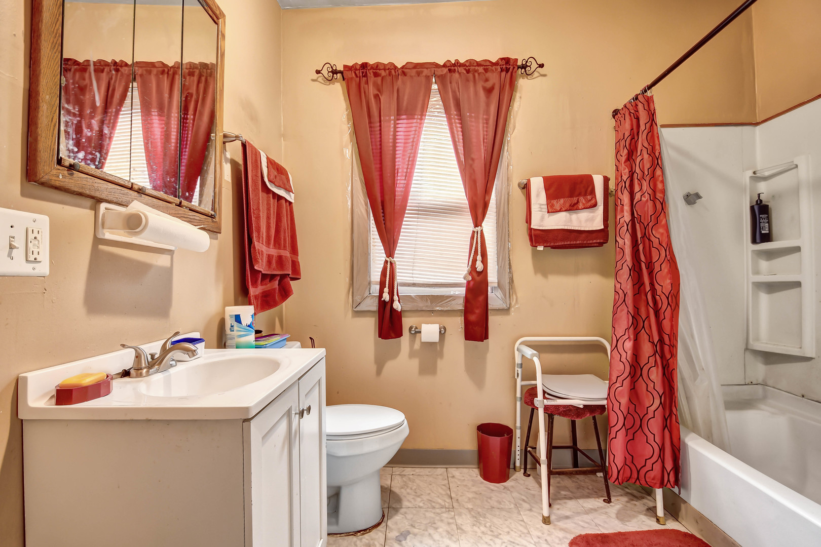 8212 South Bishop Street Chicago, IL 60620 - Photo 12 of 23 a bathroom with a sink toilet and shower