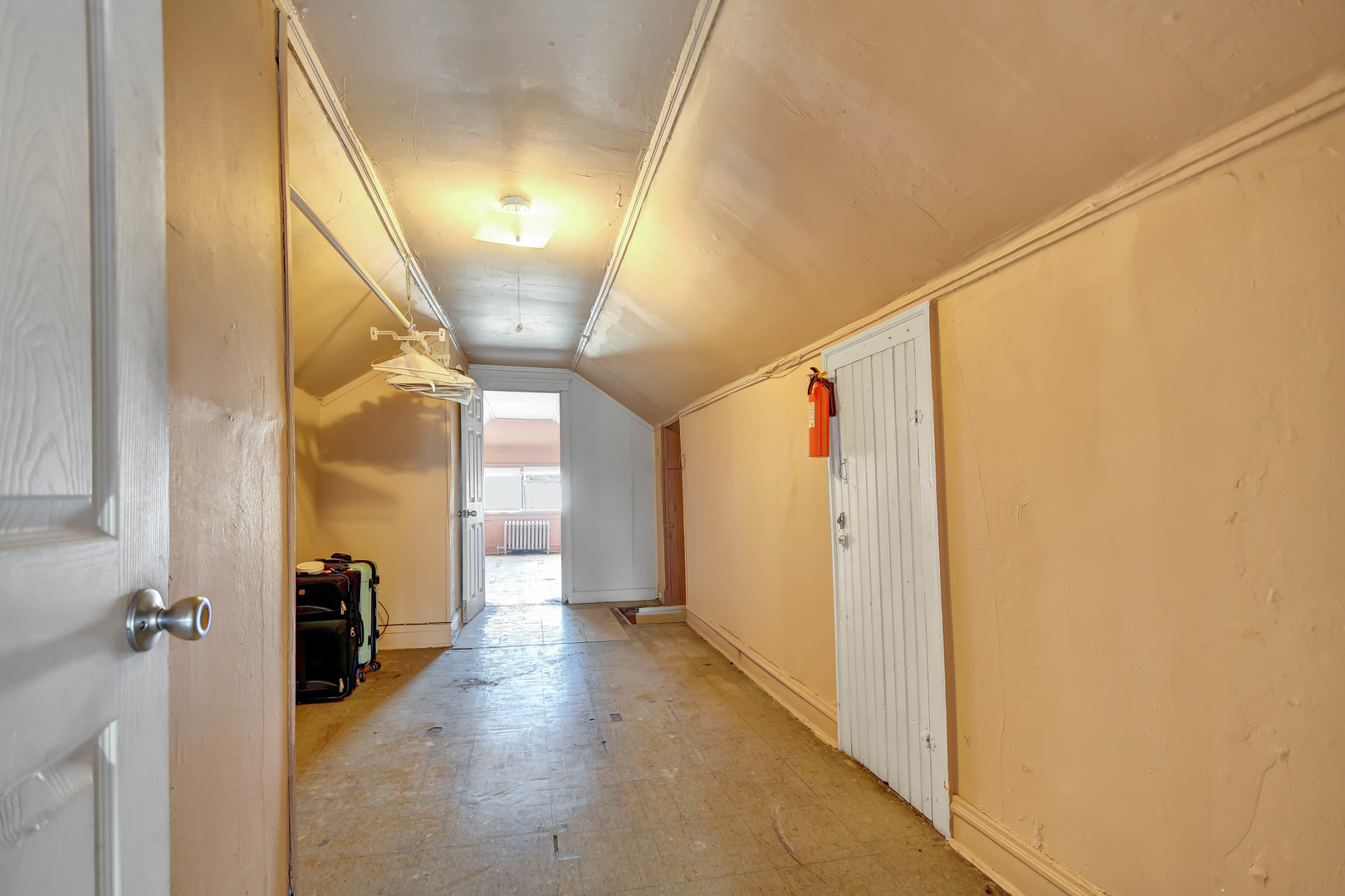 8212 South Bishop Street Chicago, IL 60620 - Photo 15 of 23 a view of a hallway view with wooden floor and staircase