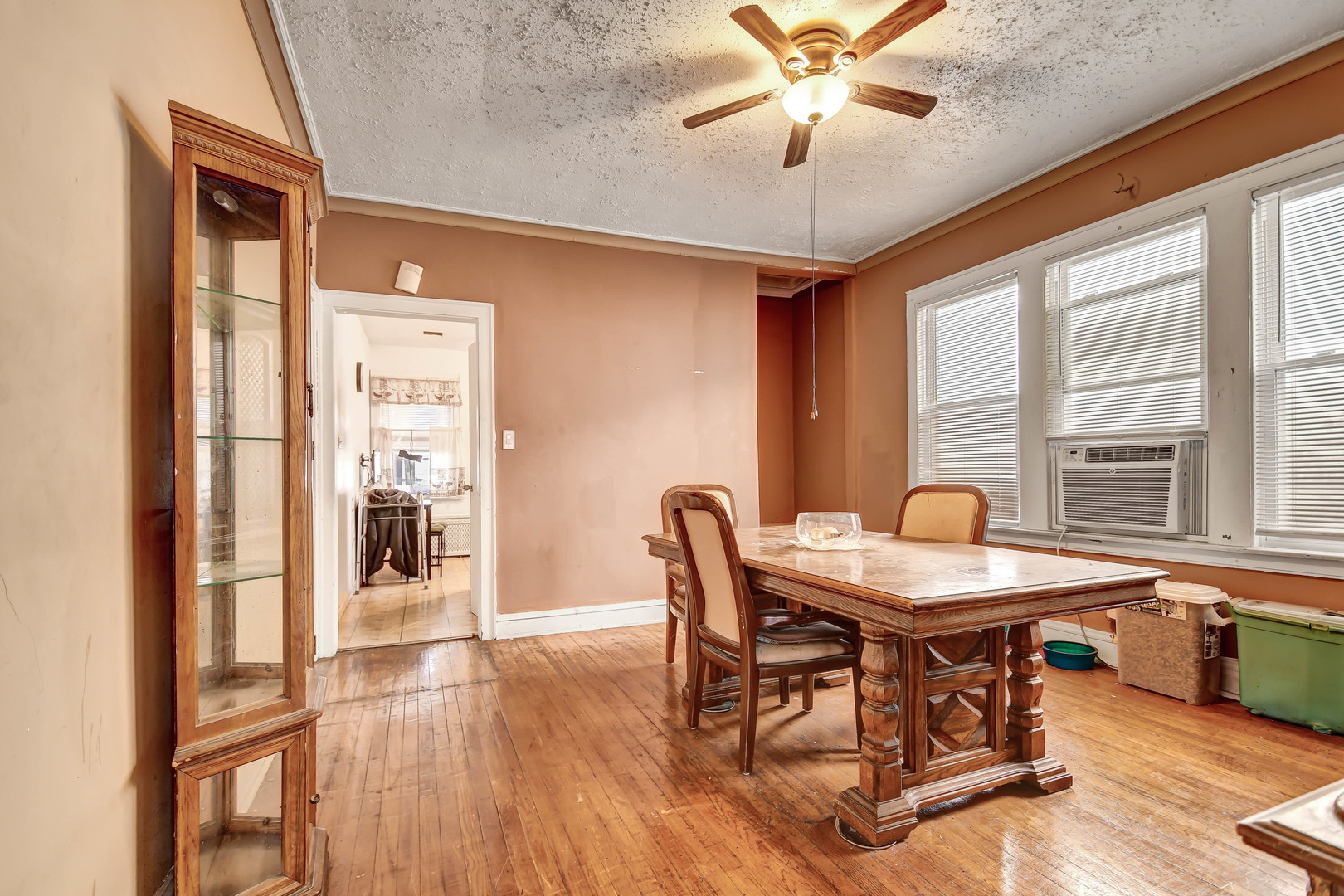 8212 South Bishop Street Chicago, IL 60620 - Photo 5 of 23 a dining room with furniture window and wooden floor