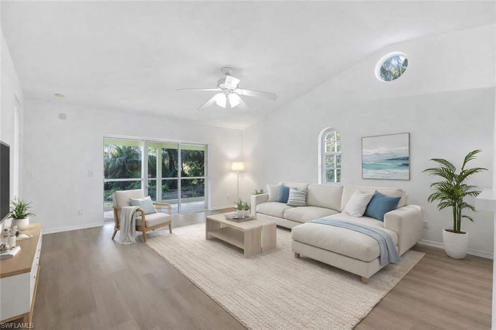 812 102nd Avenue North Naples, FL 34108 - Photo 3 of 44 Virtually Staged - Vaulted ceilings in Living Area