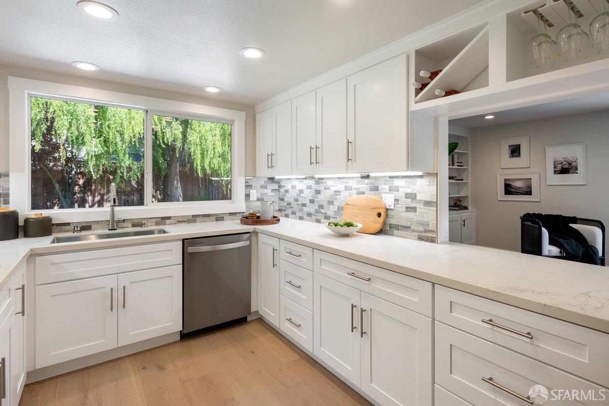 714 Wimbledon Road Walnut Creek, CA 94598 - Photo 19 of 58 a kitchen with white cabinets and white appliances