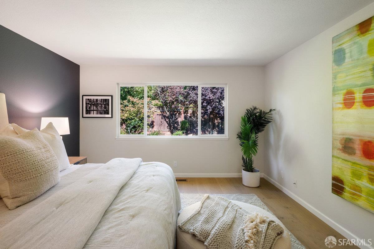 714 Wimbledon Road Walnut Creek, CA 94598 - Photo 24 of 58 a living room with furniture and a potted plant