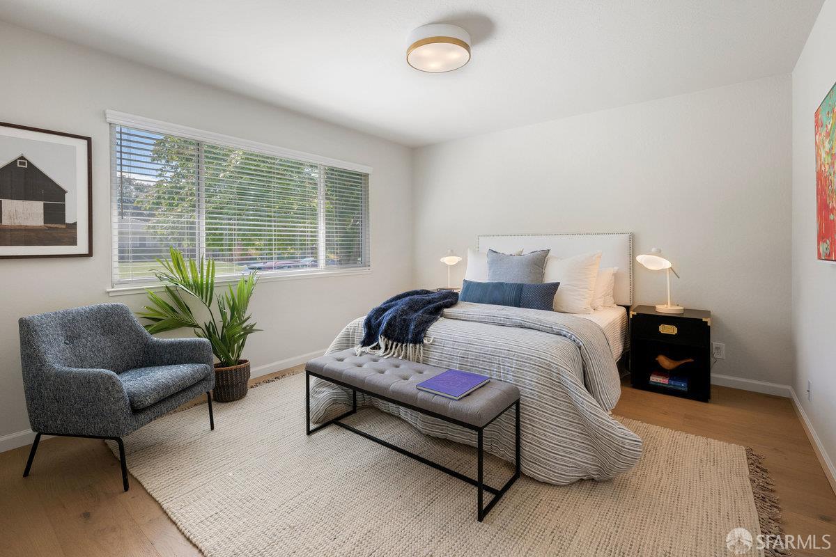 714 Wimbledon Road Walnut Creek, CA 94598 - Photo 27 of 58 a bedroom with furniture and a potted plant