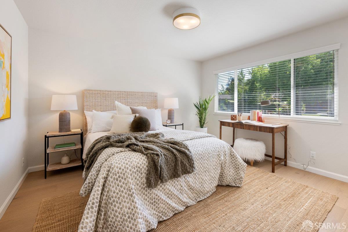 714 Wimbledon Road Walnut Creek, CA 94598 - Photo 29 of 58 a bed room with a bed and a chair