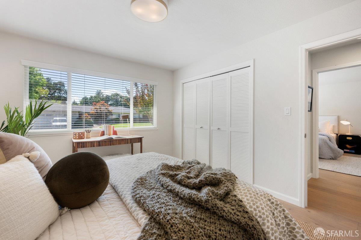 714 Wimbledon Road Walnut Creek, CA 94598 - Photo 30 of 58 a bedroom with a bed and a large window