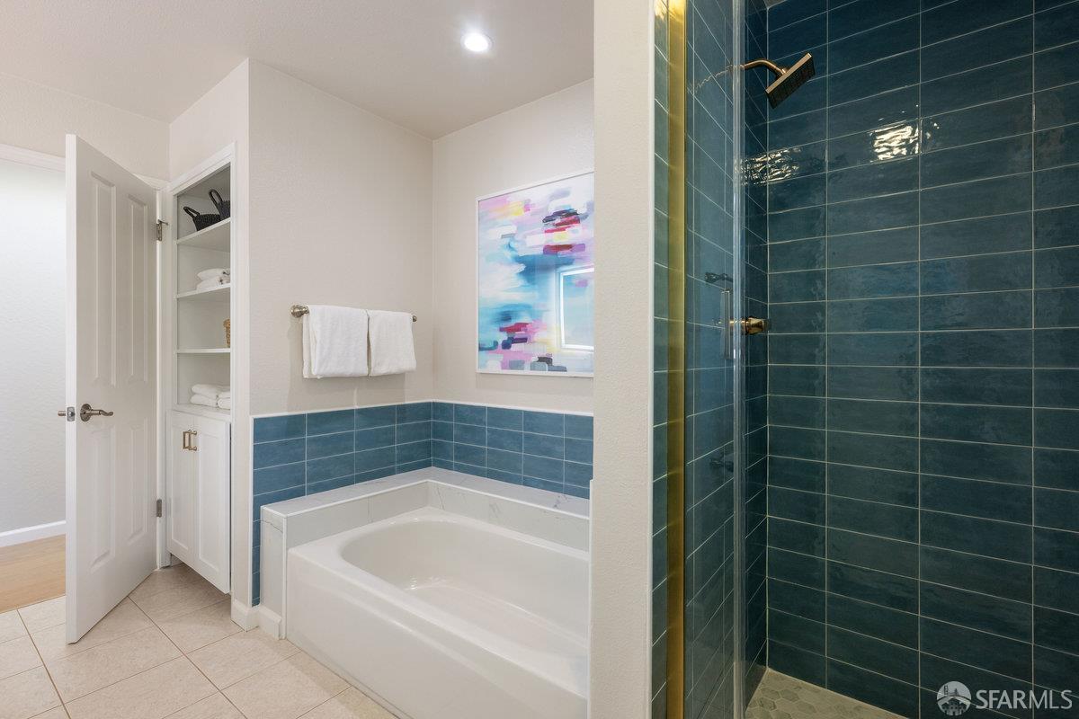 714 Wimbledon Road Walnut Creek, CA 94598 - Photo 33 of 58 a bathroom with a bathtub and a shower