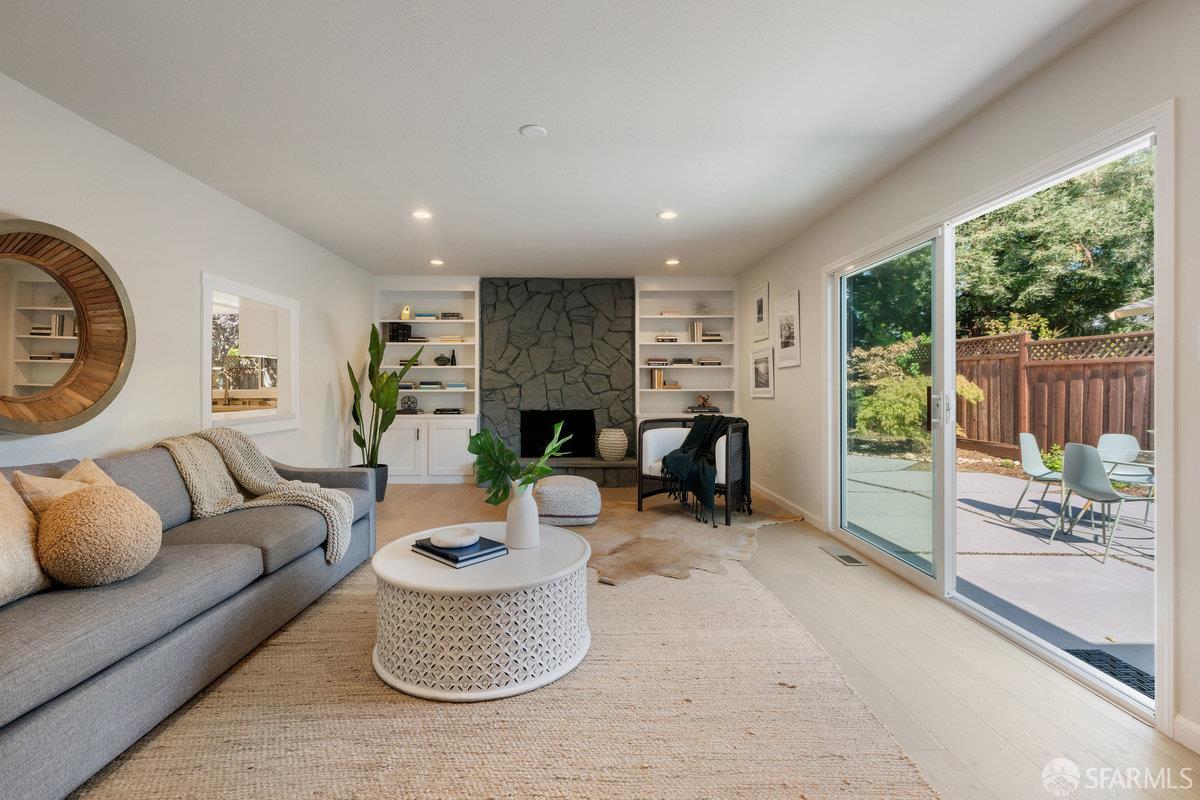 714 Wimbledon Road Walnut Creek, CA 94598 - Photo 39 of 58 a living room with furniture and a floor to ceiling window