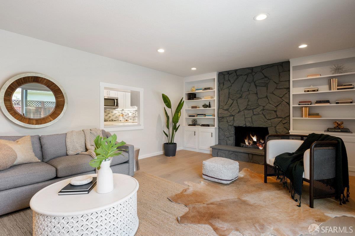 714 Wimbledon Road Walnut Creek, CA 94598 - Photo 40 of 58 a living room with furniture and a fireplace