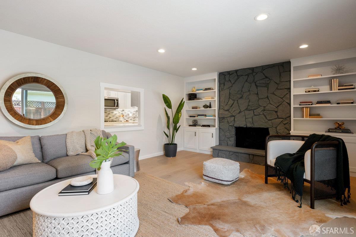 714 Wimbledon Road Walnut Creek, CA 94598 - Photo 41 of 58 a living room with furniture and a fireplace