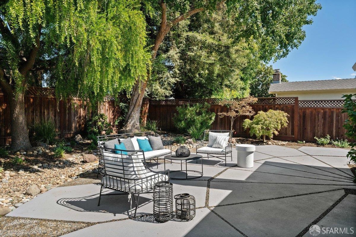 714 Wimbledon Road Walnut Creek, CA 94598 - Photo 53 of 58 a view of a chairs and table in backyard
