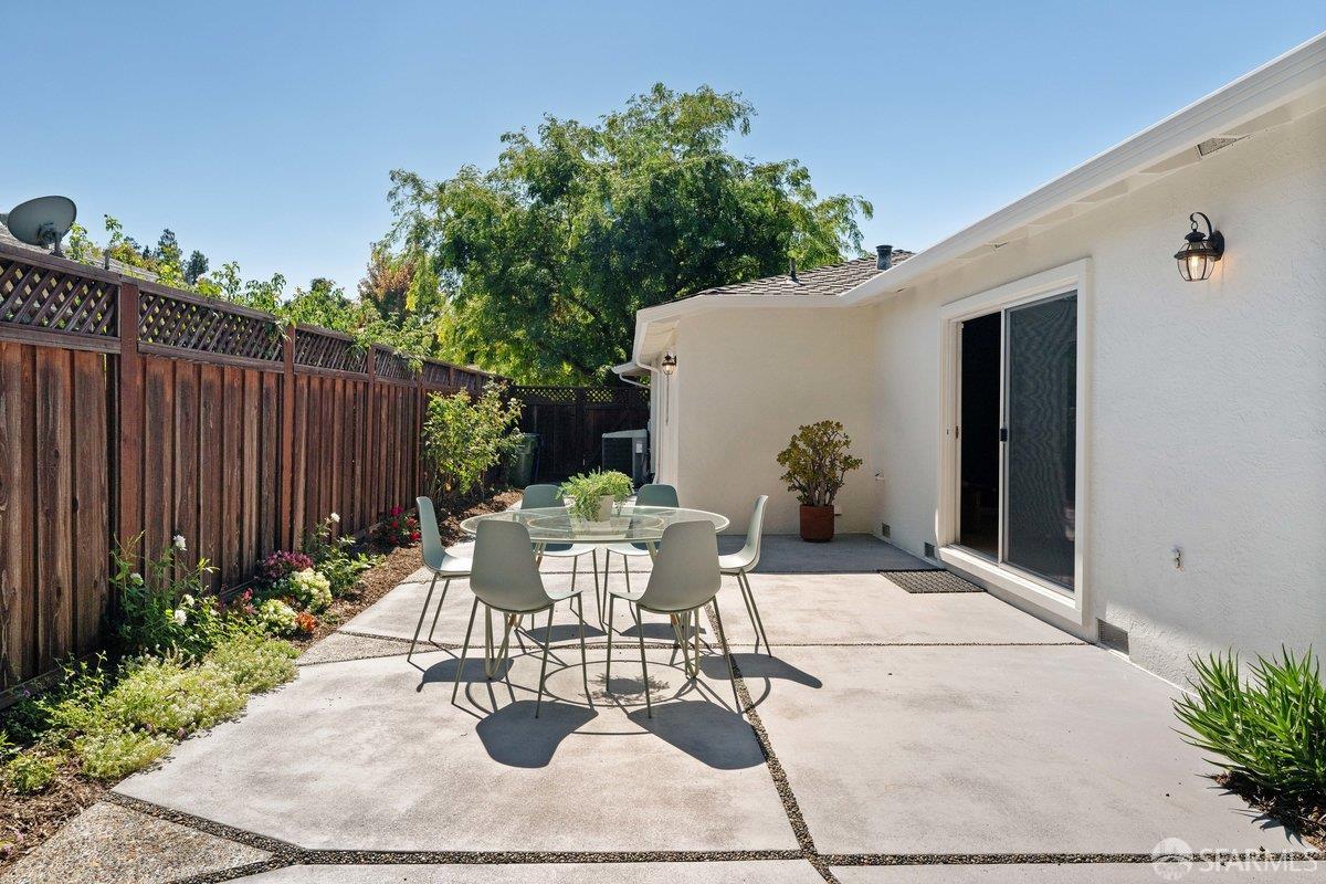 714 Wimbledon Road Walnut Creek, CA 94598 - Photo 56 of 58 a backyard of a house with table and chairs