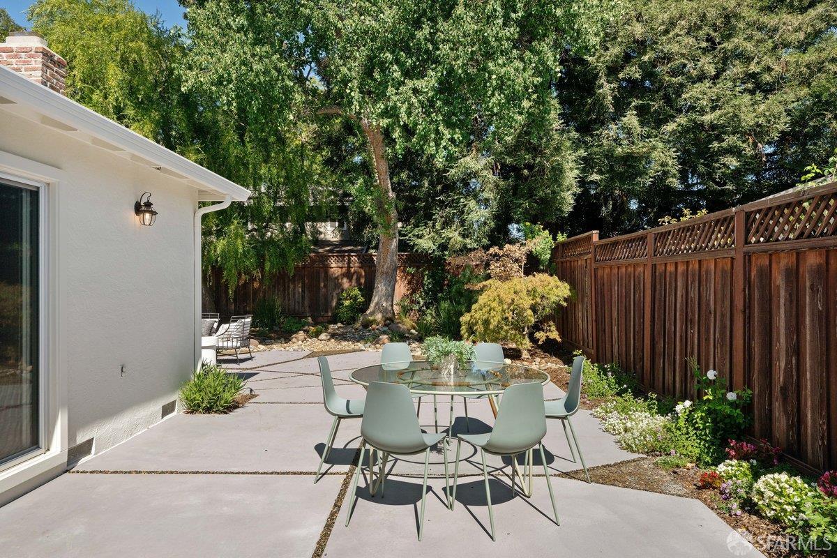 714 Wimbledon Road Walnut Creek, CA 94598 - Photo 57 of 58 a view of a chairs and table in backyard