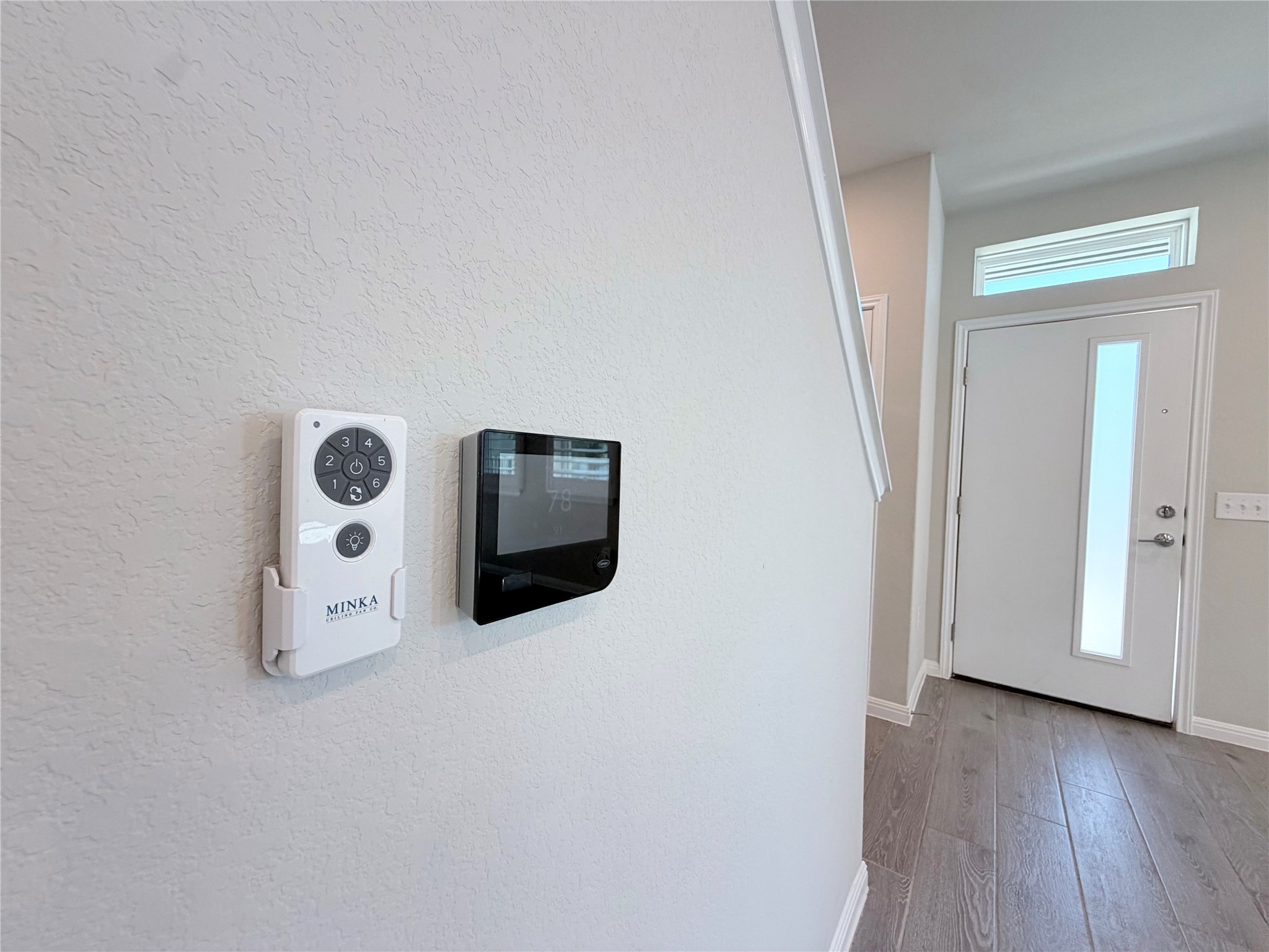 9015 Cattle Baron Path, Unit 605 Austin, TX 78747 - Photo 10 of 29 Modern smart home technology integrates seamlessly near the bright entry foyer.