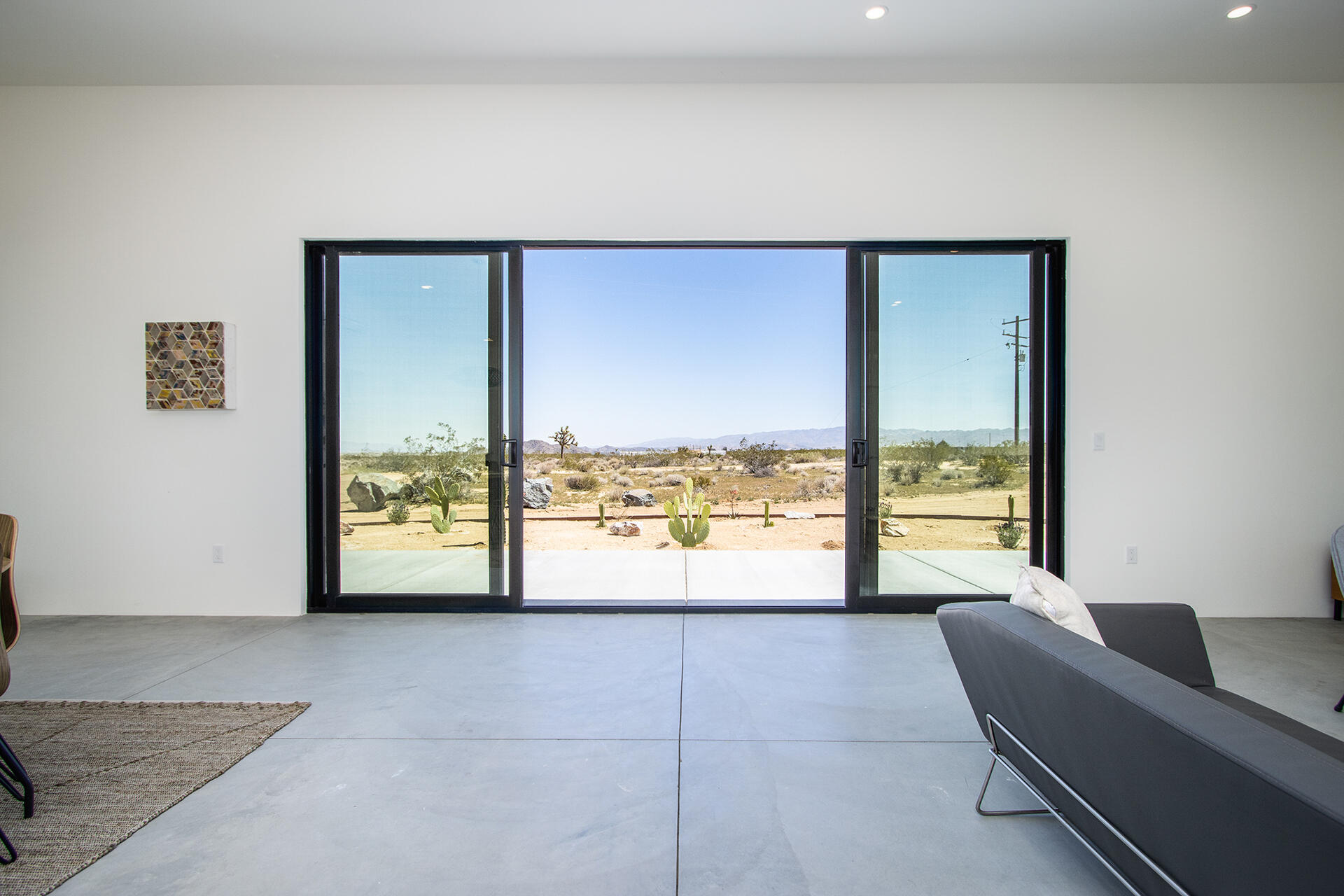 1370 Mc Garry Road Joshua Tree, CA 92252 - Photo 5 of 32 a view of an empty room and window