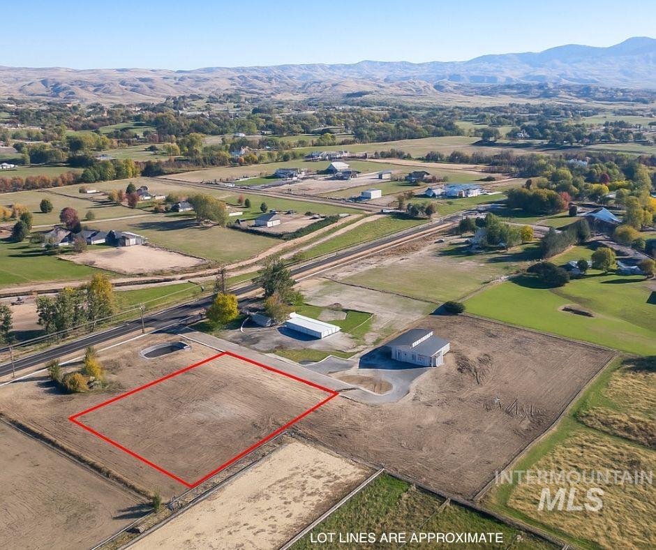 Tbd Tbd Emerald Lane Eagle, ID 83616 - Photo 2 of 3 Aerial overview of property's location featuring property parcel outlined and a mountainous background
