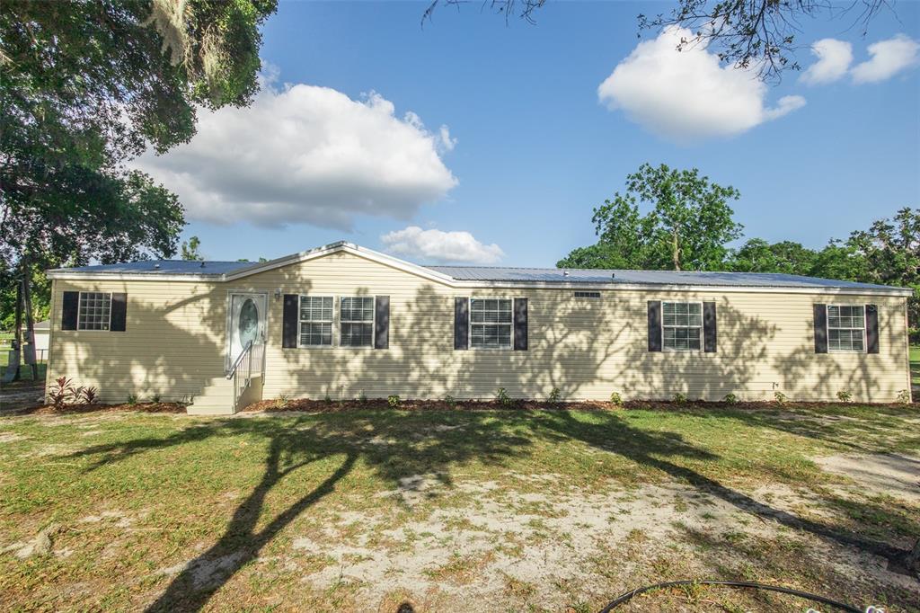 5606 Hendricks Road Lakeland, FL 33811 - Photo 1 of 1 a view of a back yard of the house