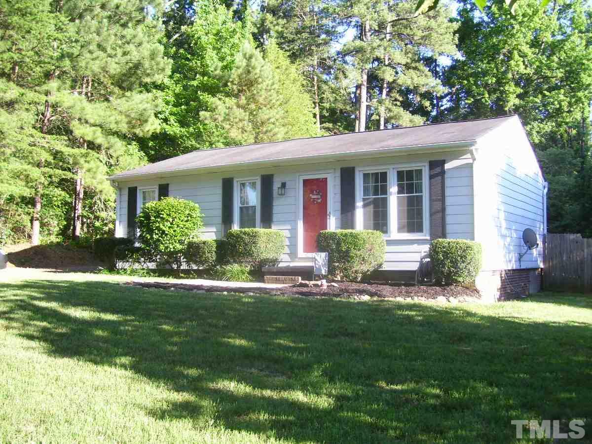 2153 Winkler Road Durham, NC 27712 - Photo 1 of 21 a view of a house with a yard and potted plants