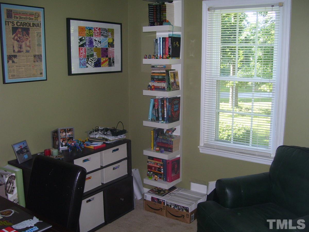 2153 Winkler Road Durham, NC 27712 - Photo 13 of 21 a livingroom with fridge and a window