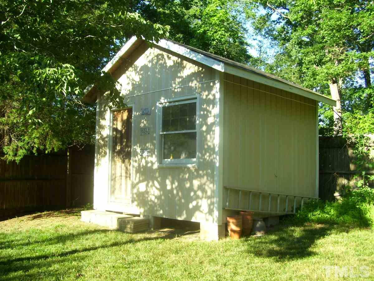 2153 Winkler Road Durham, NC 27712 - Photo 16 of 21 a backyard of a house with yard and outdoor seating