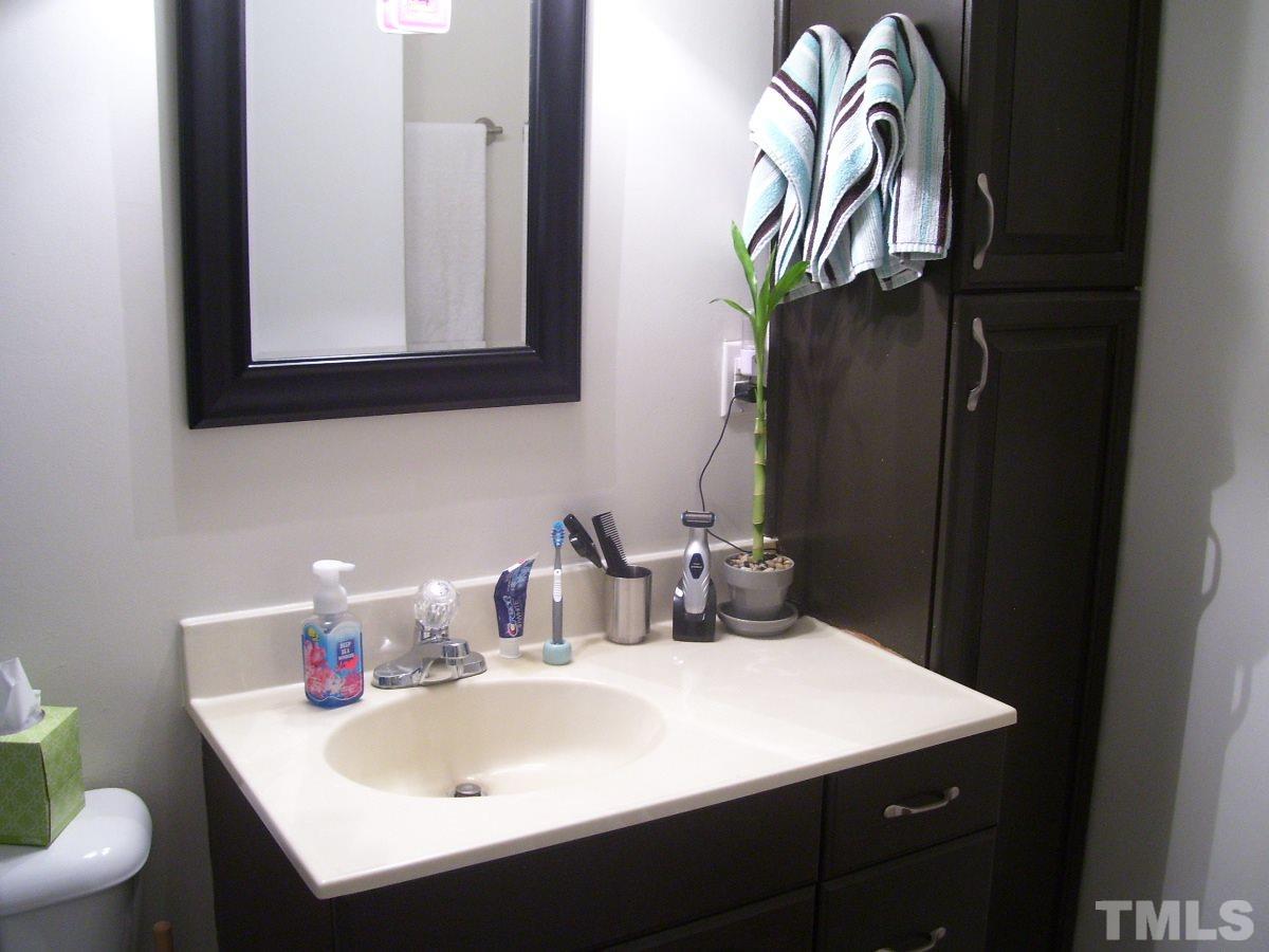 2153 Winkler Road Durham, NC 27712 - Photo 3 of 21 a bathroom with a sink and a toilet