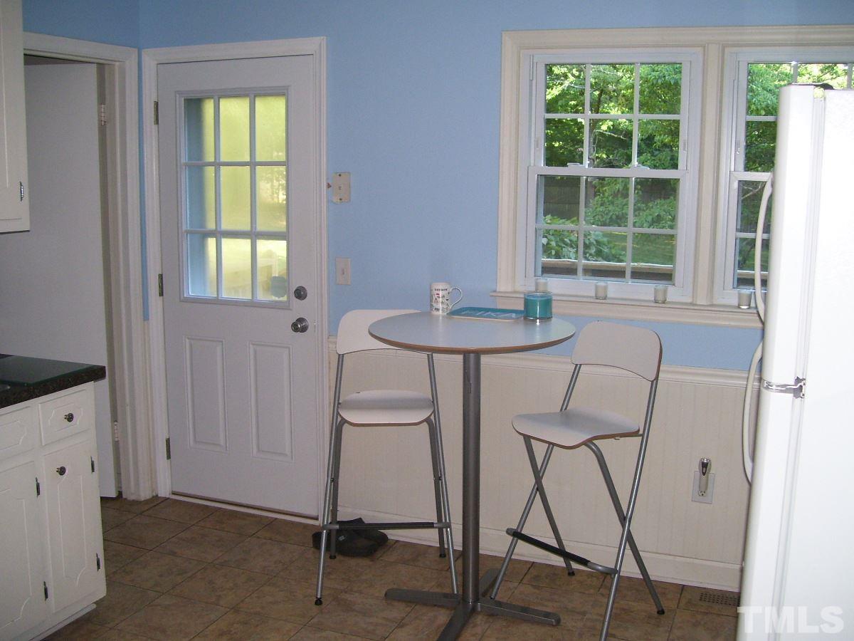 2153 Winkler Road Durham, NC 27712 - Photo 7 of 21 a dining room with furniture and window