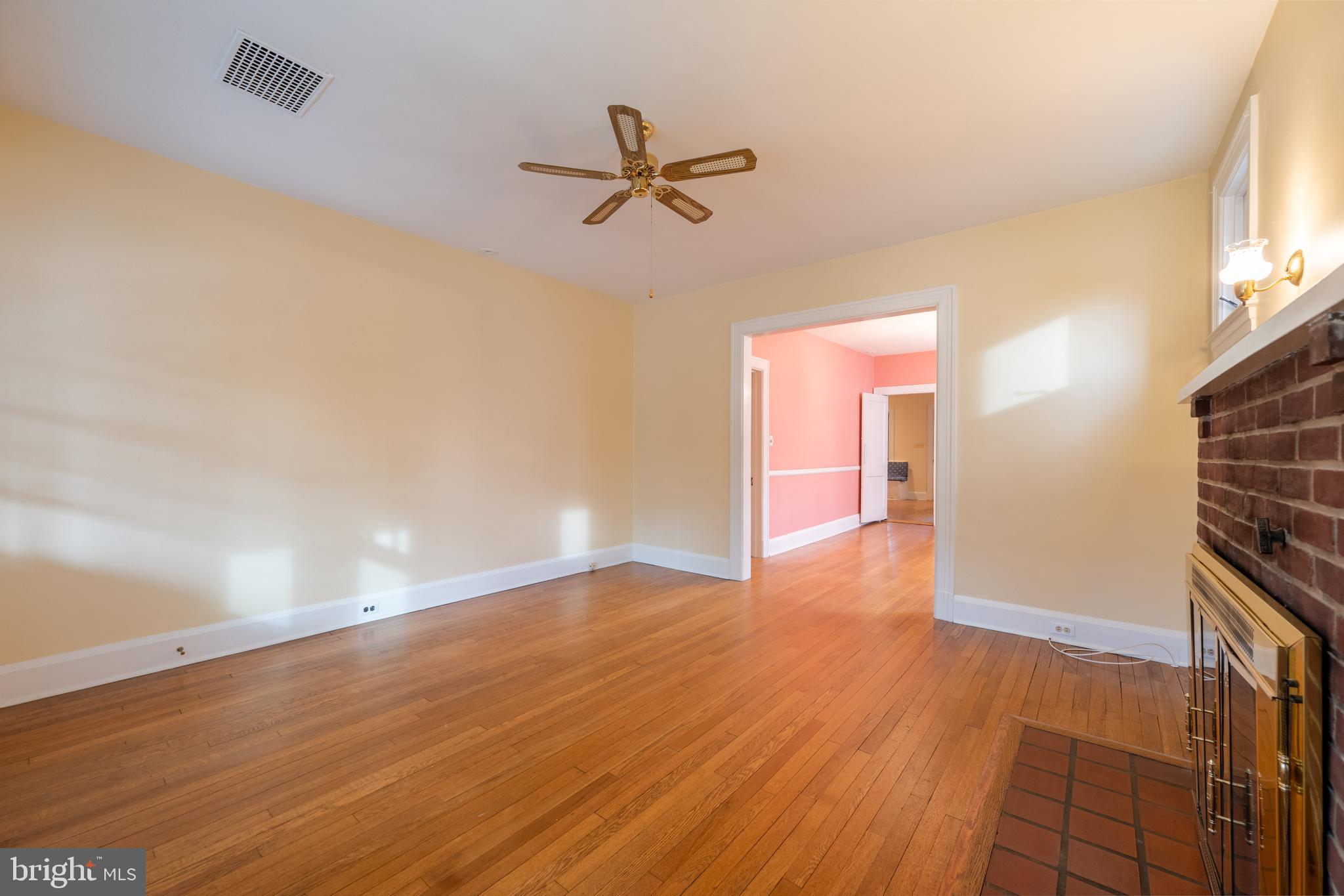 706 Anneslie Road Baltimore, MD 21212 - Photo 10 of 56 Living Room- Headed into Dining Room