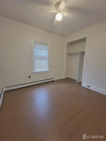 an empty room with a empty space and a window