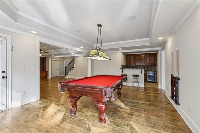 a kitchen with a sink and a stove