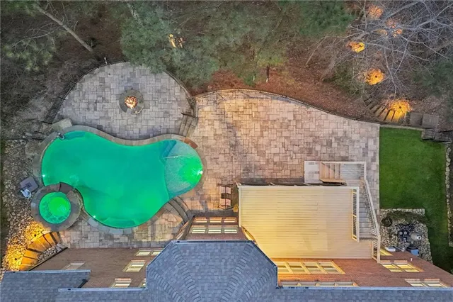 a view of a pathway with a yard