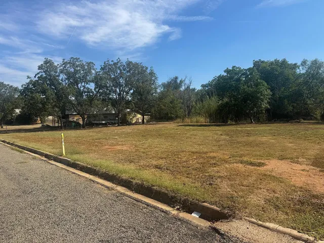 a view of a swimming pool and an outdoor space