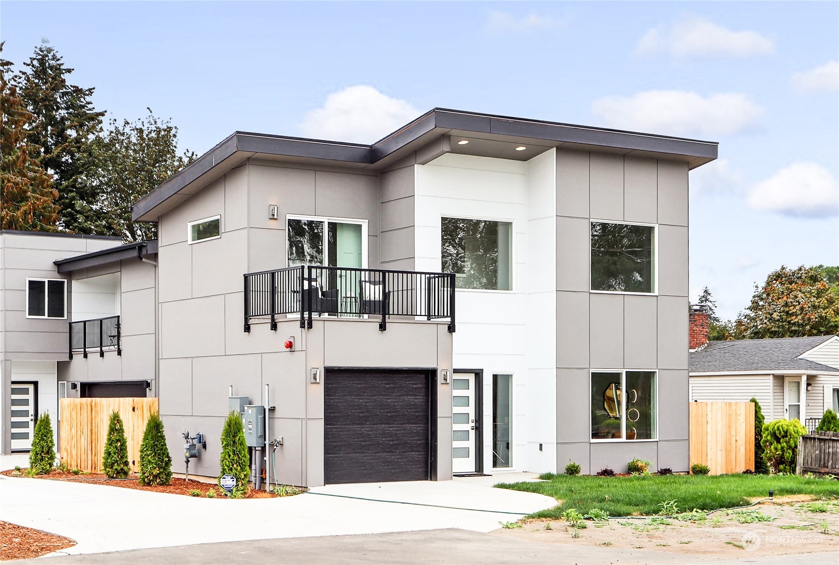 846 Southwest 136th Street, Unit 1 Burien, WA 98166 - Photo 18 of 18 a view of white house with a yard