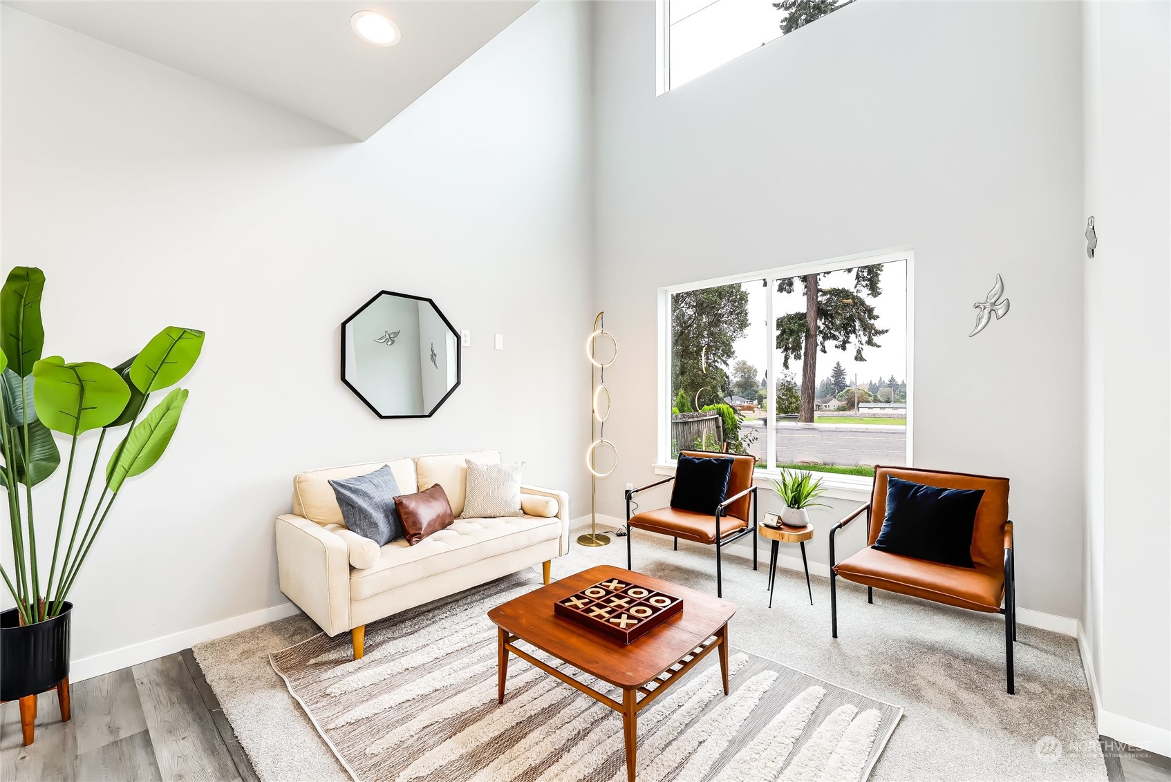 846 Southwest 136th Street, Unit 1 Burien, WA 98166 - Photo 2 of 18 a living room with furniture a rug potted plant and a window