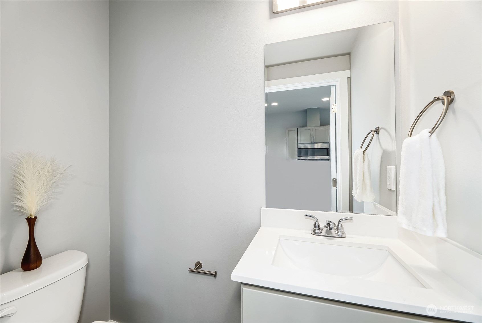 846 Southwest 136th Street, Unit 1 Burien, WA 98166 - Photo 9 of 18 a bathroom with a sink and a toilet