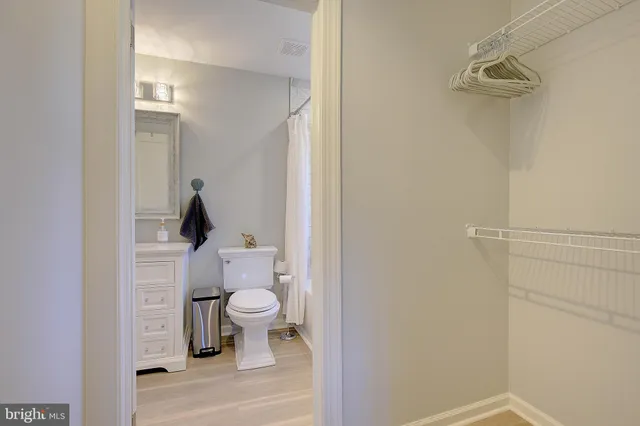 a bathroom with a toilet and a sink