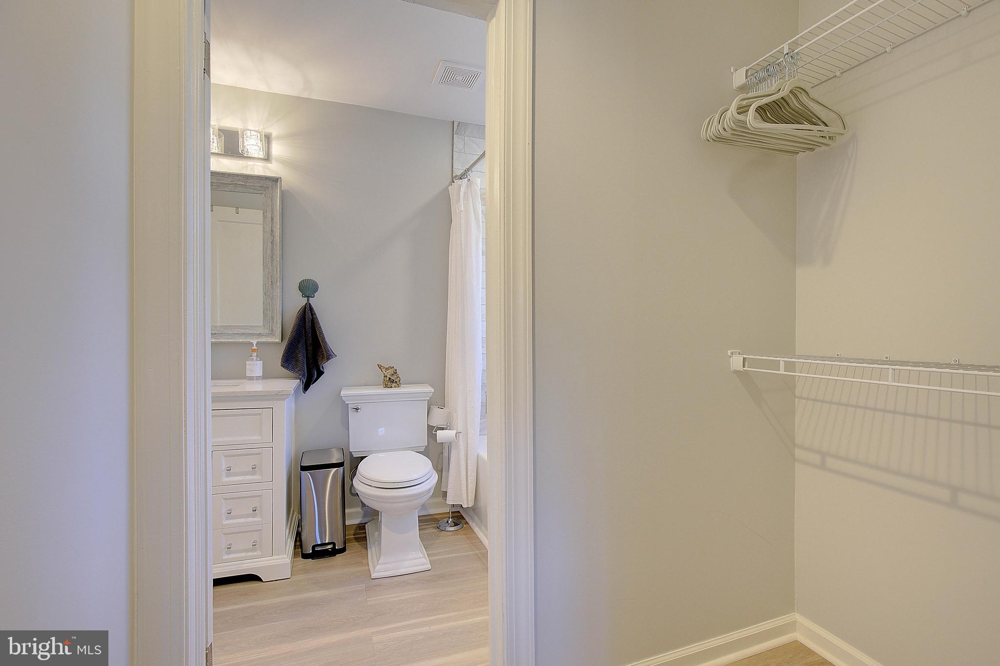 20938 Olen Mattingly Road Avenue, MD 20609 - Photo 21 of 47 a bathroom with a toilet and a sink