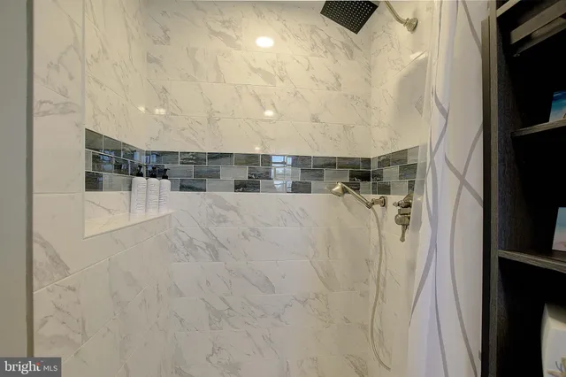 a view of a hardwood floor and a projector room