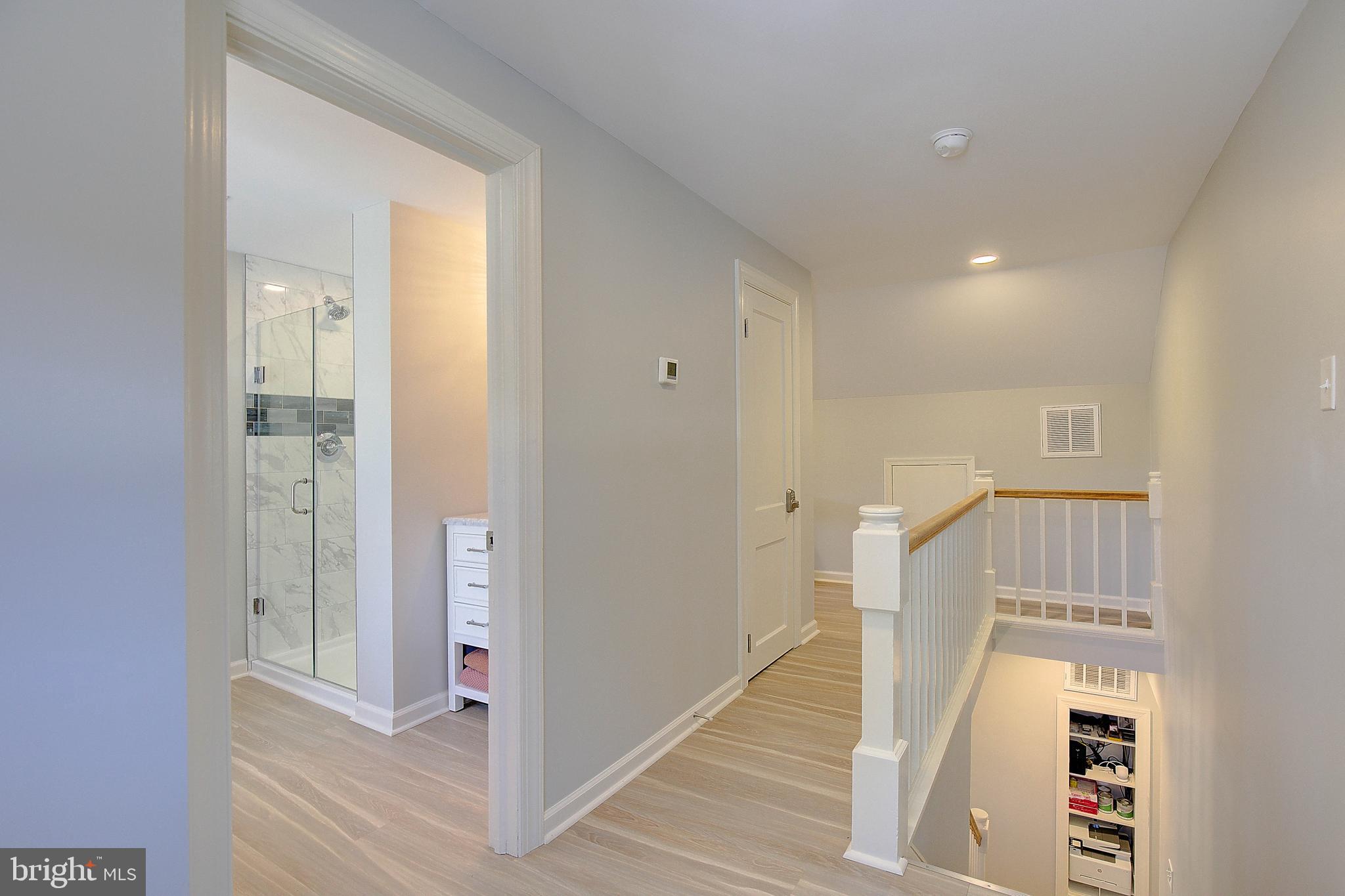 20938 Olen Mattingly Road Avenue, MD 20609 - Photo 27 of 47 a view of a hallway with wooden floor and entryway