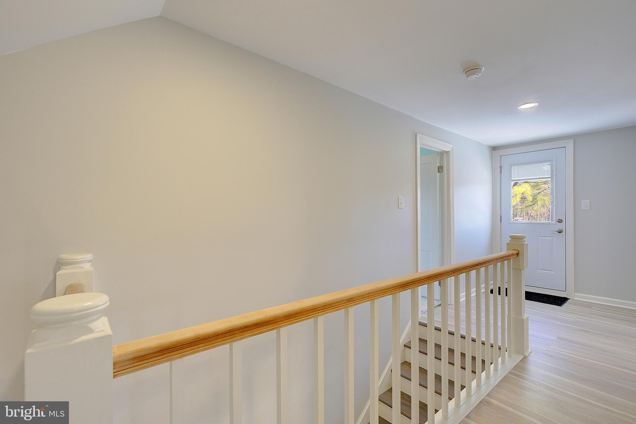 20938 Olen Mattingly Road Avenue, MD 20609 - Photo 28 of 47 a view of staircase with white walls
