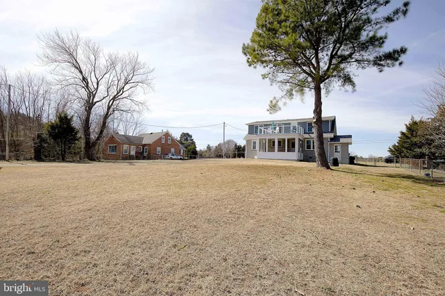 a view of garage and yard