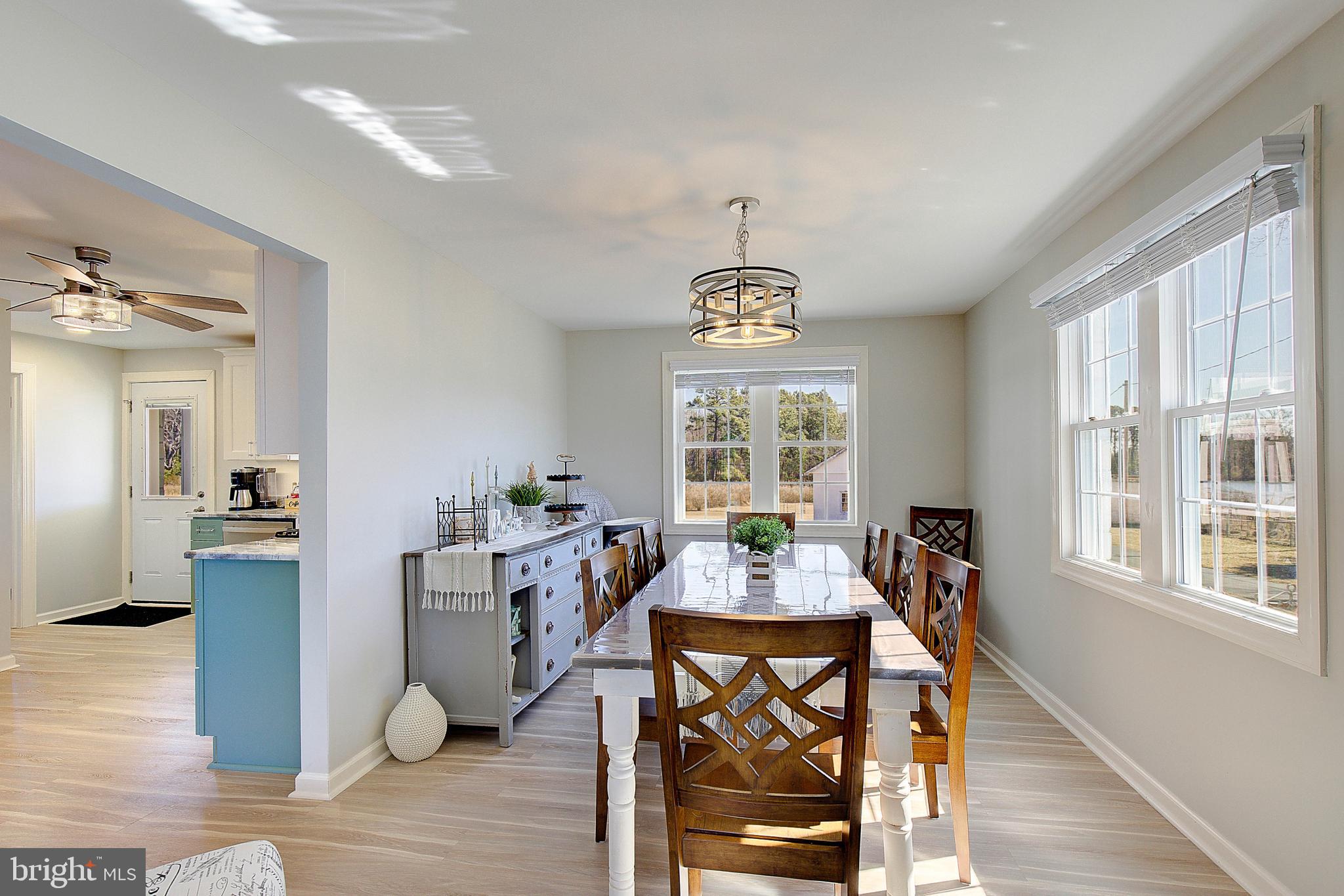 20938 Olen Mattingly Road Avenue, MD 20609 - Photo 6 of 47 a view of a dining room with furniture window and wooden floor