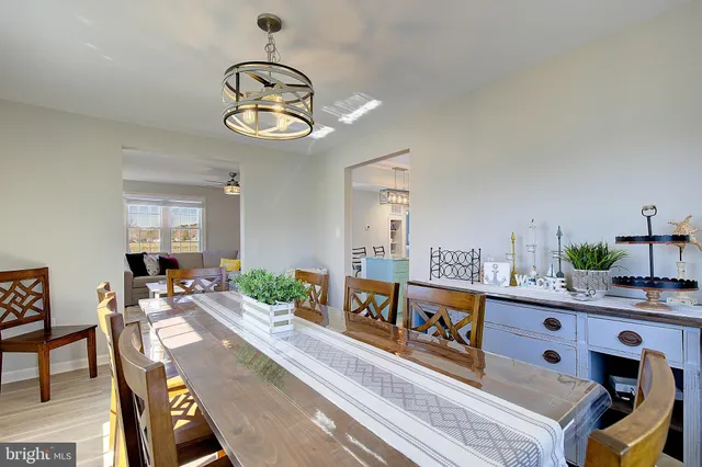 a view of a living room and dining room