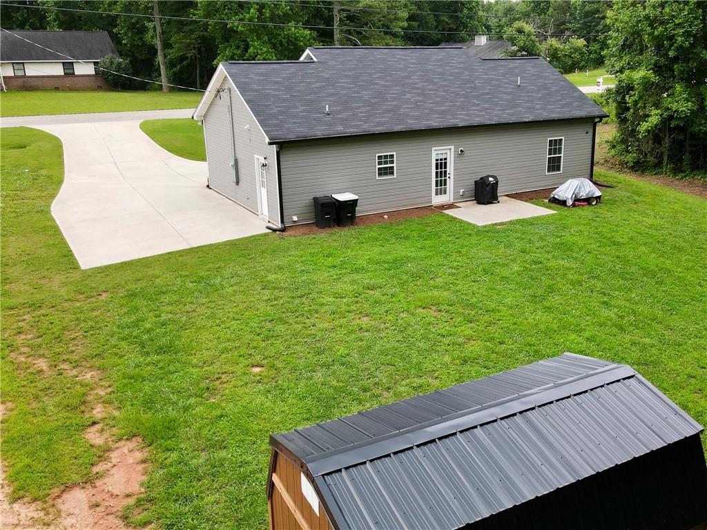 1776 Pleasant Grove Road Temple, GA 30179 - Photo 39 of 45 a view of a wooden deck and a yard