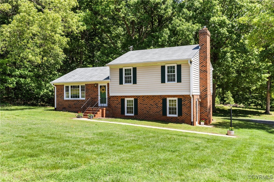 2137 Dogtown Road Goochland, VA 23063 - Photo 1 of 40 Tri-level home featuring a chimney, a front lawn,