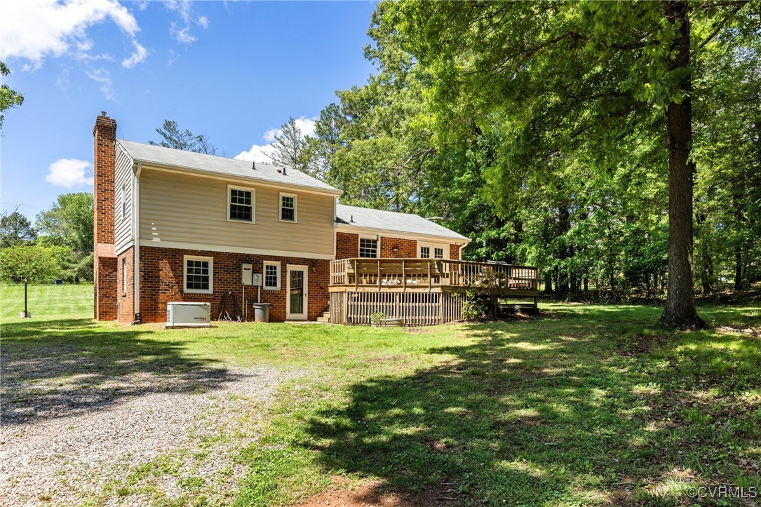 2137 Dogtown Road Goochland, VA 23063 - Photo 27 of 40 Back of property featuring a deck, a chimney, bric