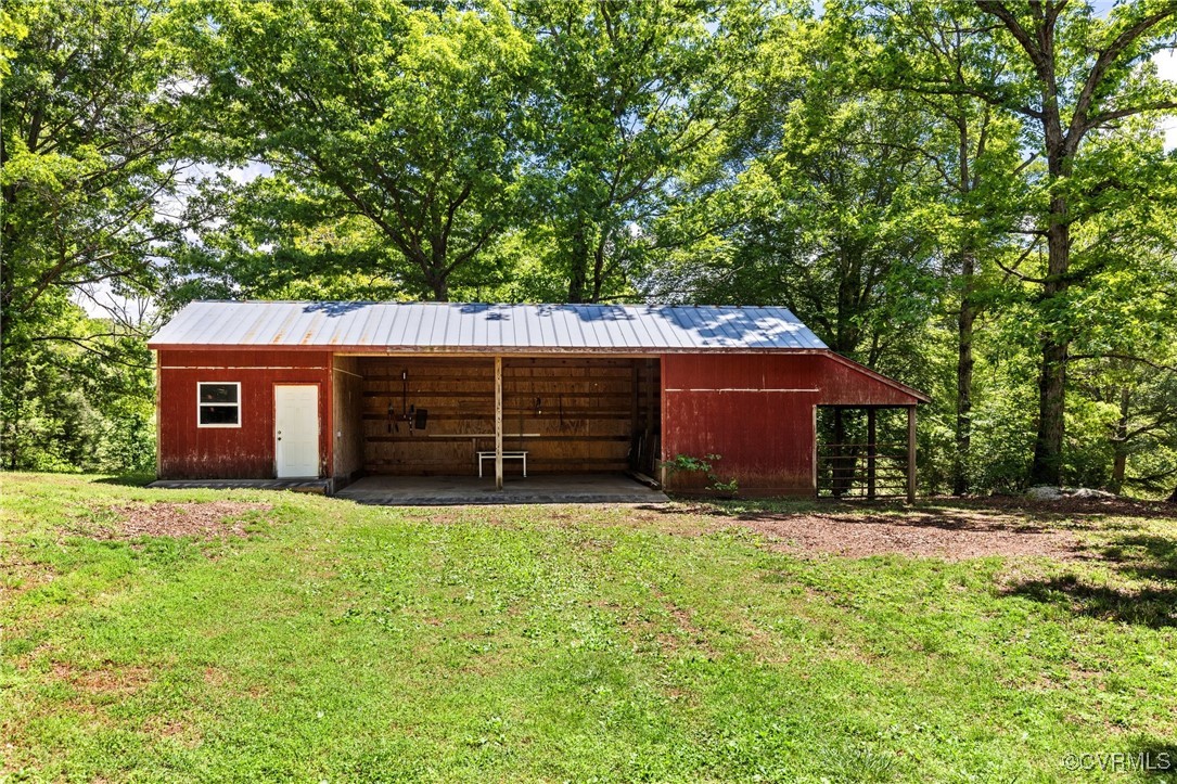 2137 Dogtown Road Goochland, VA 23063 - Photo 29 of 40 View of pole building featuring a lawn