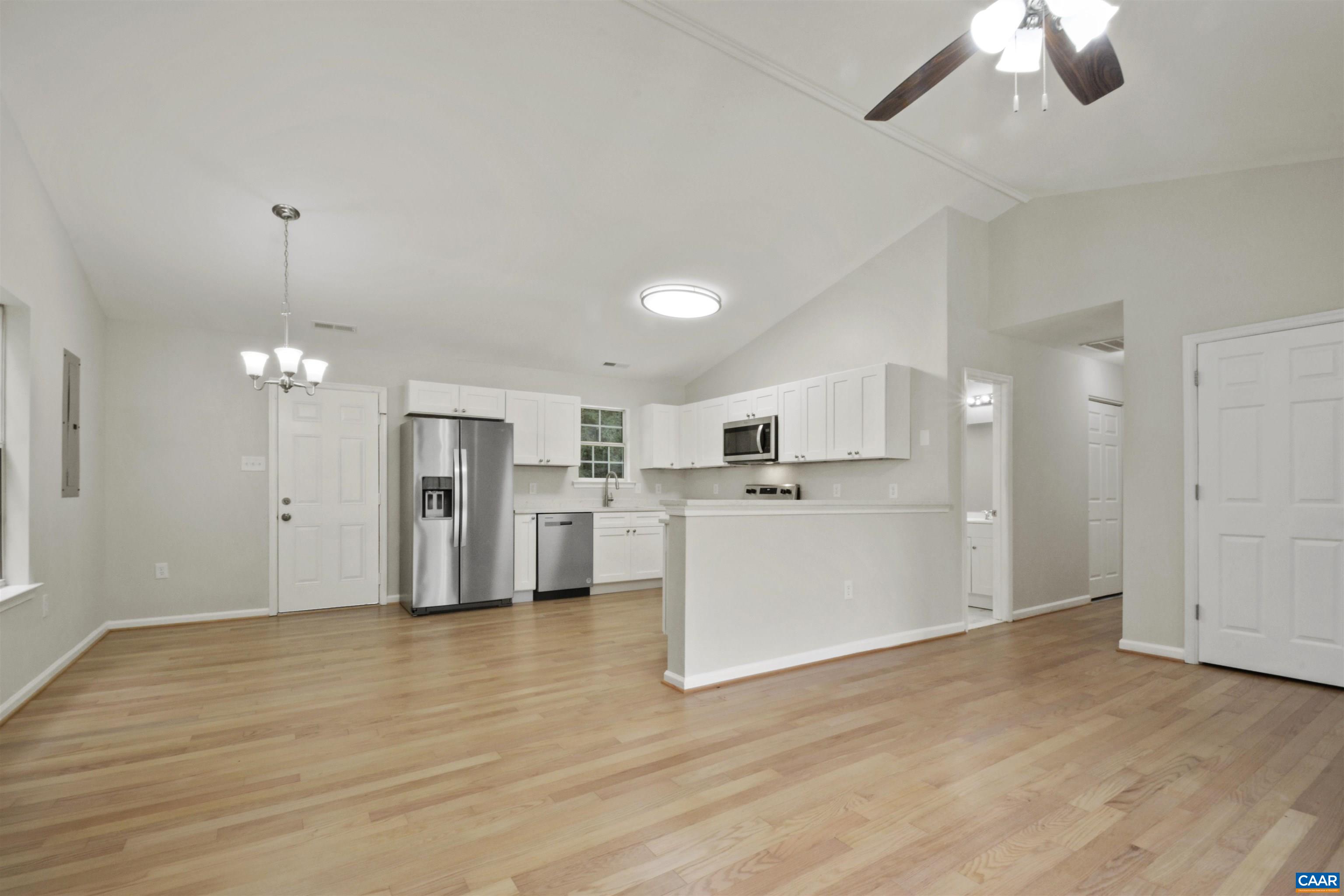 263 Morning Glory Road Ruckersville, VA 22968 - Photo 8 of 24 a view of a kitchen with an empty space and a window