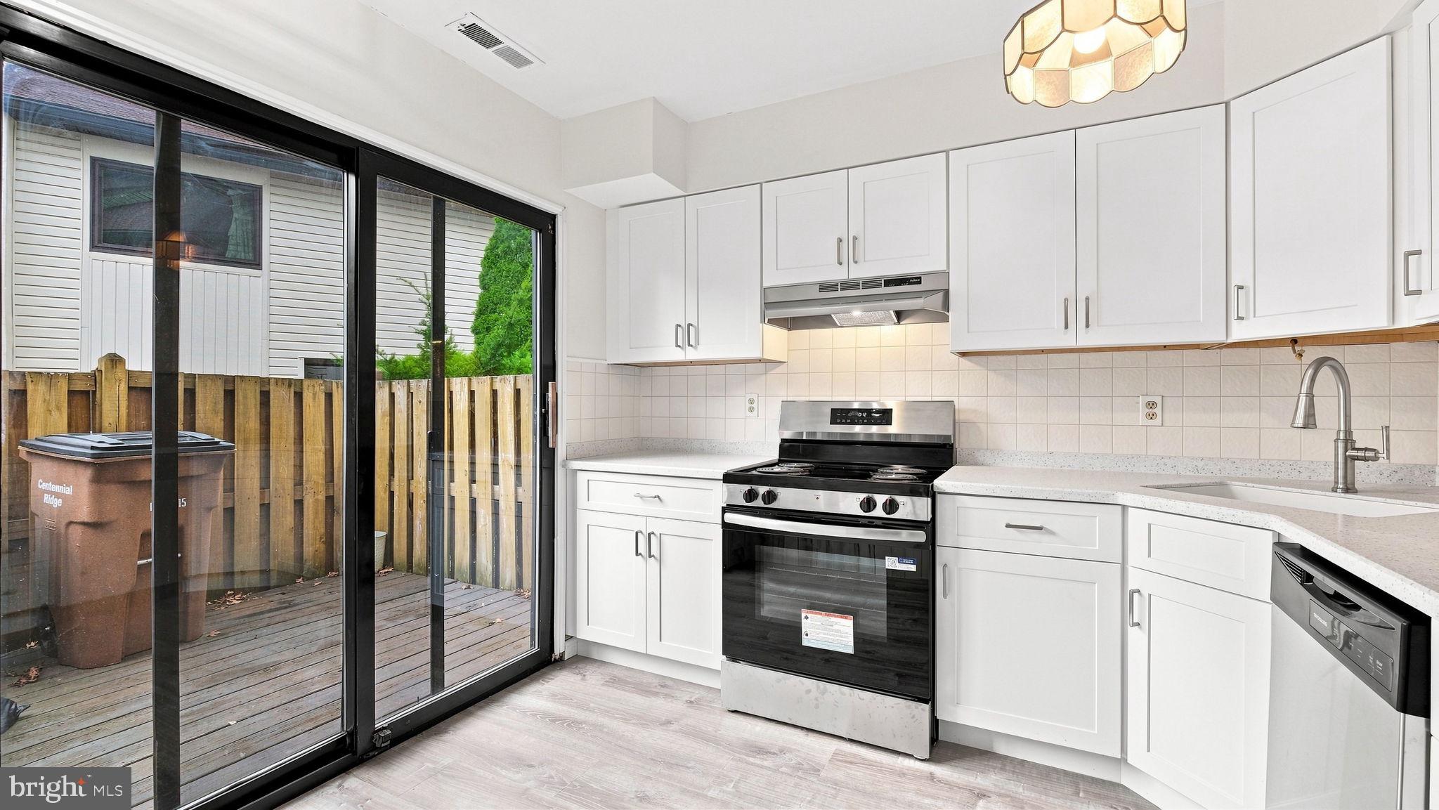 23 Centennial Road Telford, PA 18969 - Photo 3 of 21 Bright and airy kitchen with outdoor access.