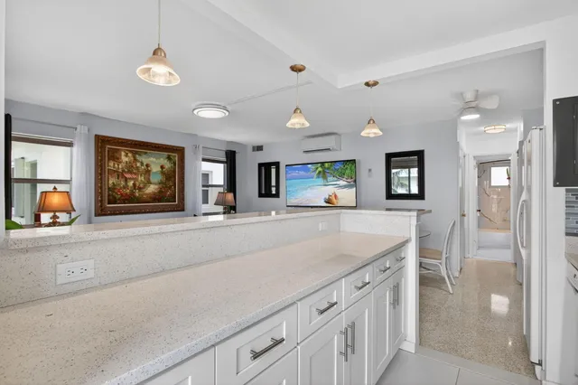 a living room with furniture and window