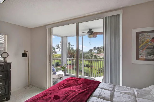 a view of a balcony with furniture